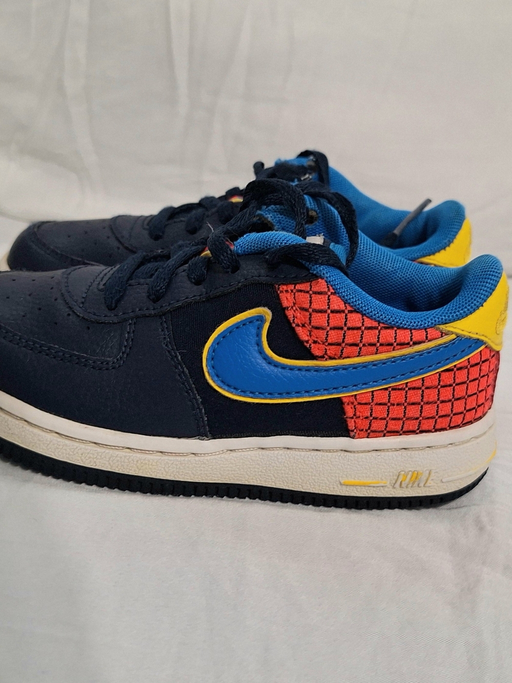 Nike Kids Navy, Blue & Red Low-Top Sneakers with Yellow Accents